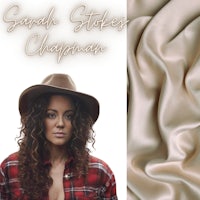 a woman wearing a hat and a plaid shirt