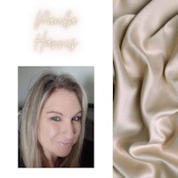 a photo of a woman with a beige silk fabric