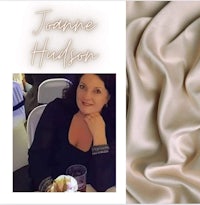 a woman is sitting in front of a table with a cup of coffee