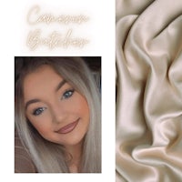 a photo of a woman with blond hair and a beige satin