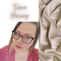 a photo of a woman with glasses and a piece of fabric